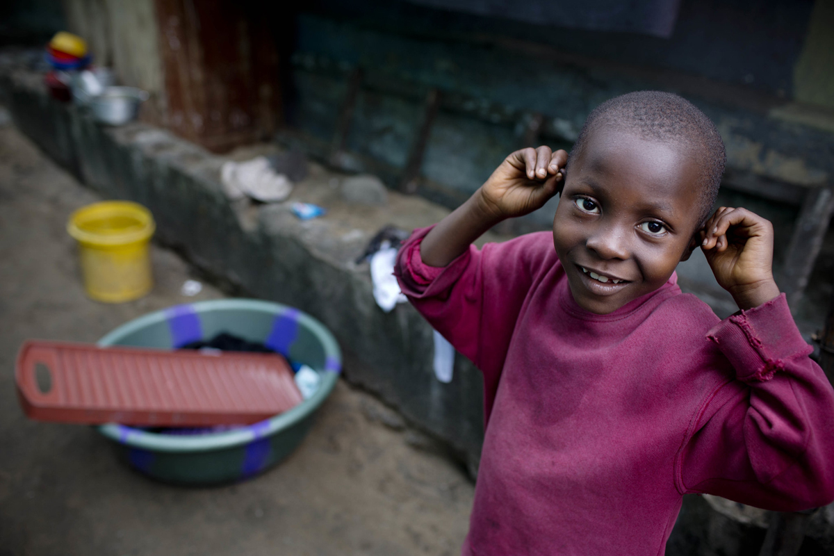 A child smiles for the camera