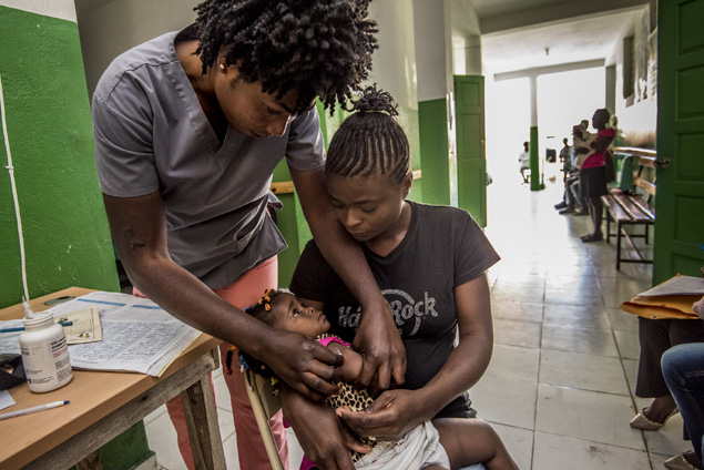 A vaccine is administered to an infant