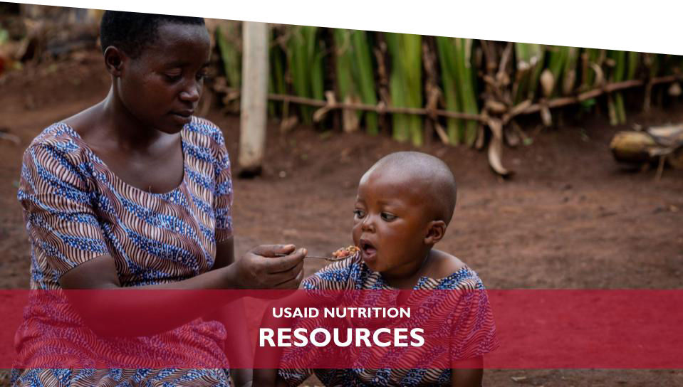 USAID Nutrition Resource Hub | A mother feeds a baby. Photo Credit: Michael Stulman, Catholic Relief Services