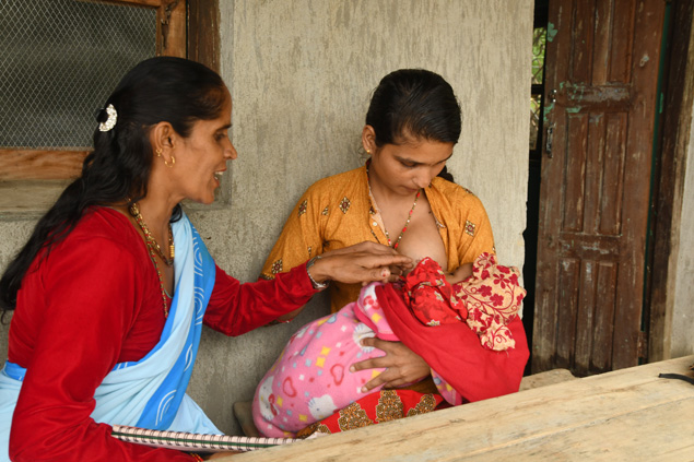 A mother breastfeeds in Nepal.