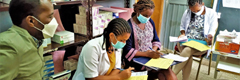 Students wearing protective mask sit in class