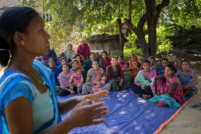 Female Community Health Worker Jharana Kumari Tharu councils a group of women, including expectant mothers and those who have recently delivered, on good health practices in Binauna village, in Nepalís Banke District.