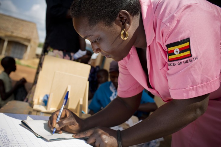 Juliet Nanziwa, a 30-year-old nurse, administer vaccines at a newly opened health centre in Nondwe Iganga, Uganda. 