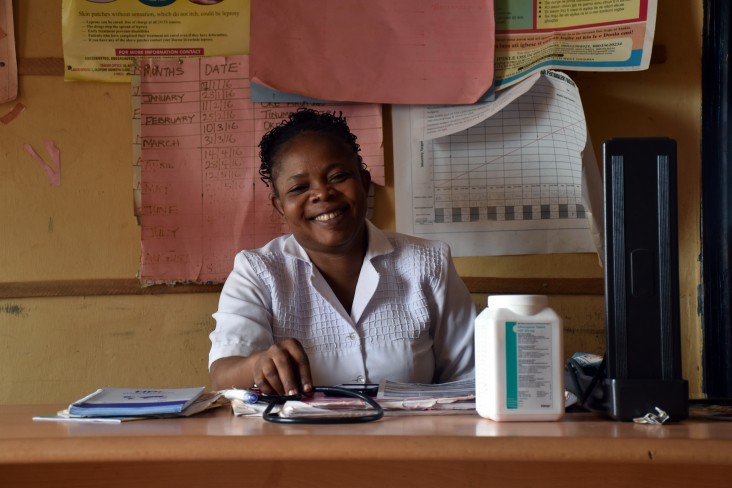 PHC Alekuwodo Officer-in-Charge Titilayo Aremu sits at her newly lit desk.