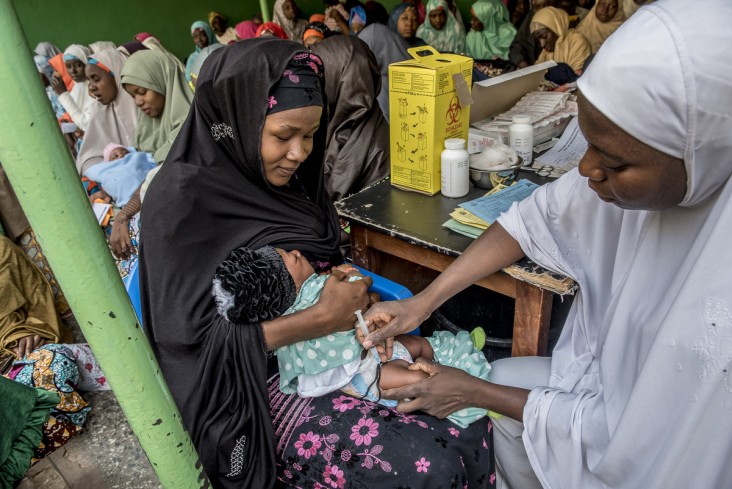 A vaccine is administered to an infant