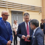 USAID Vietnam Acting Mission Director Bradley Bessire (left) and U.S. Ambassador Daniel J. Kritenbrink (center) talk with AstraZeneca Vietnam Chairman and General Director Nitin Kapoor at the handover event. 