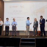 USAID/Vietnam Mission Director Aler Grubbs (third right) presents trophies to representatives (provincial Departments of Health and hospitals) of 13 sites that have received USAID-funded liquid oxygen systems.