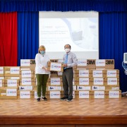 The equipment is delivered by USAID/Vietnam Mission Director Ann Marie Yastishock to Vice Director of the Tay Ninh Department of Health Dr. Nguyen Van Cuong at Trang Bang District Health Center.