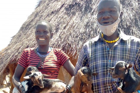 Aretho and Lojo show off the goats in Aretho’s care.